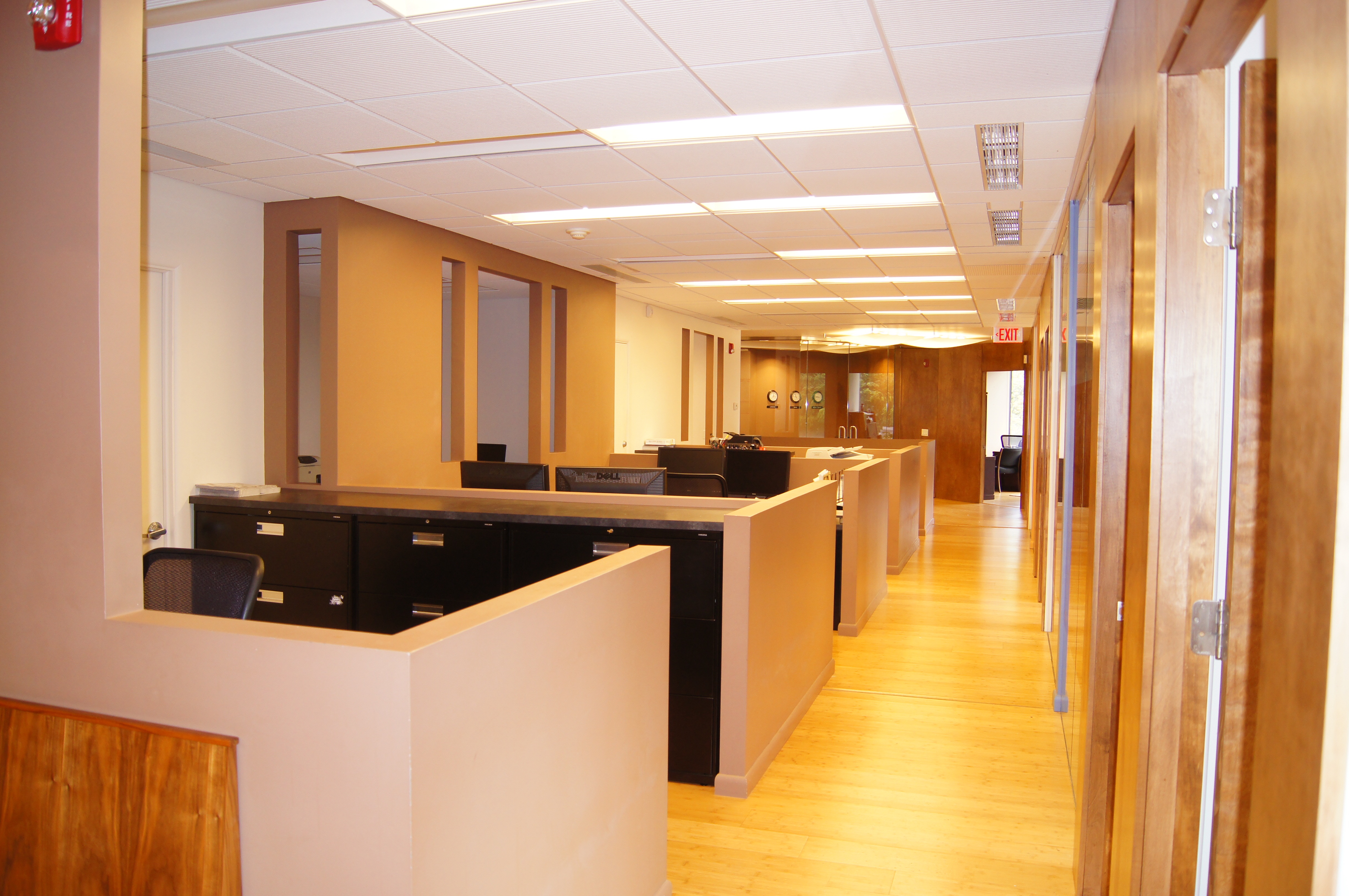Bullpen and corridor view inside the office