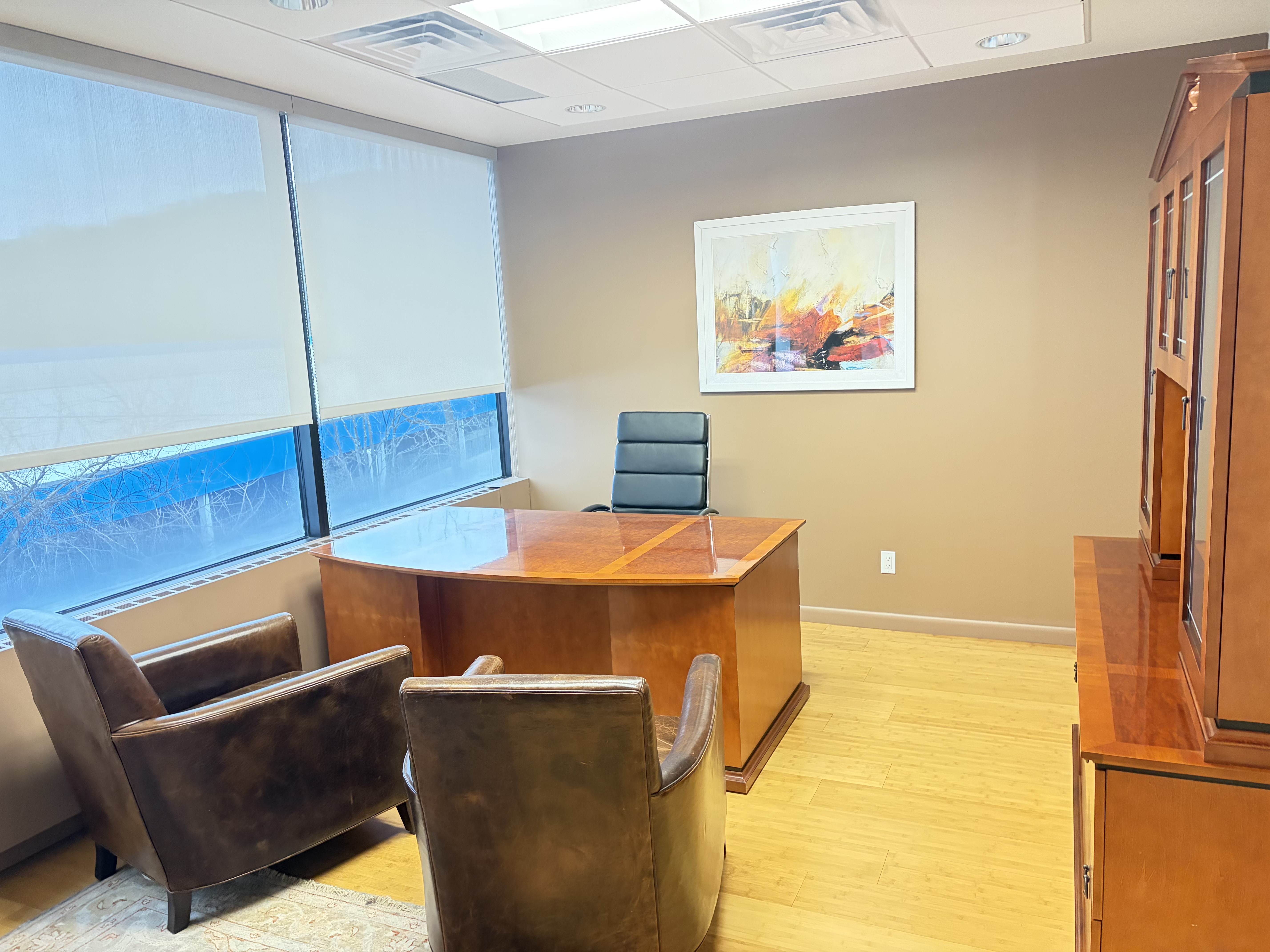 Second private office with furniture and windows