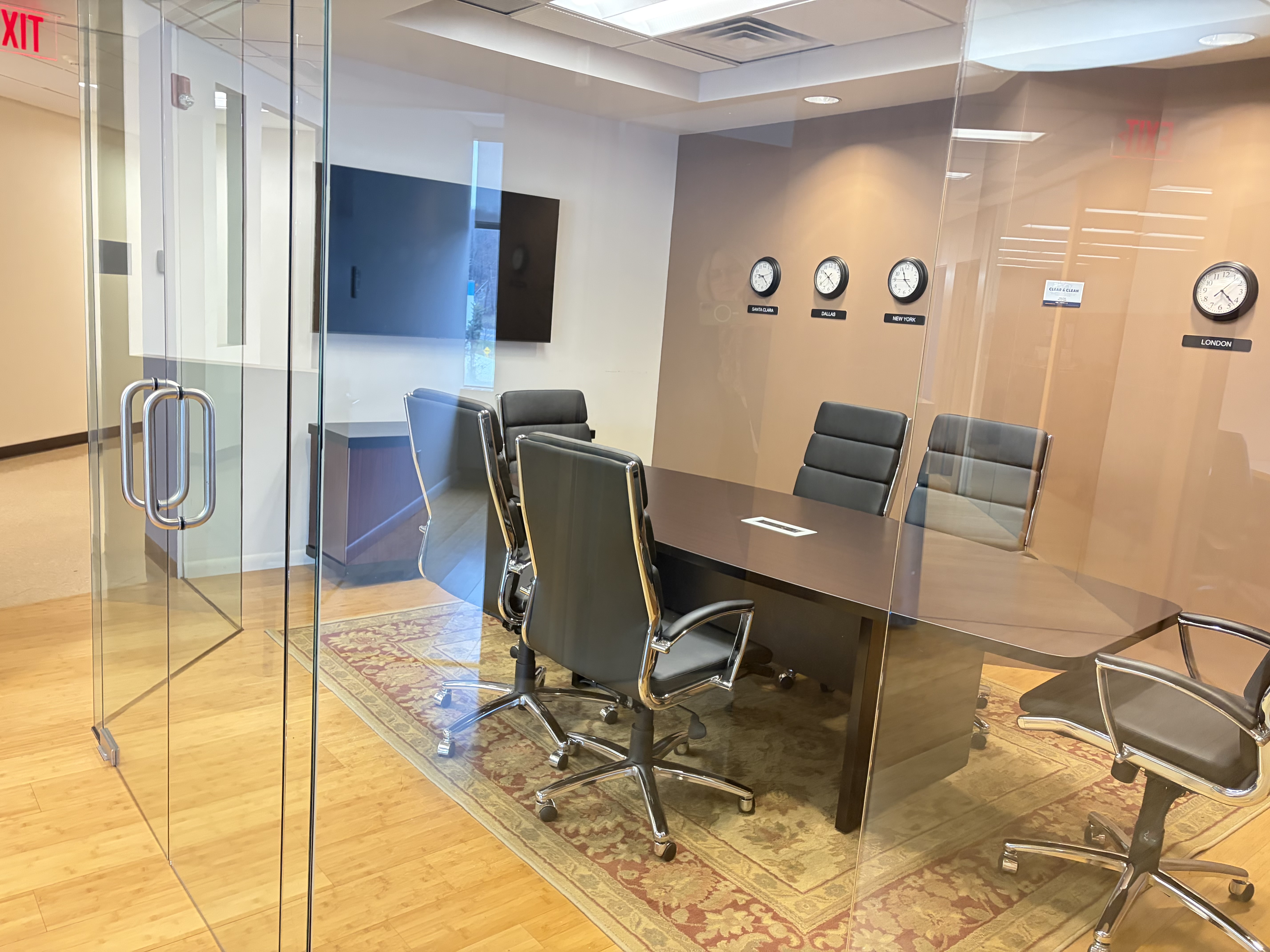 Glass conference room inside the office suite