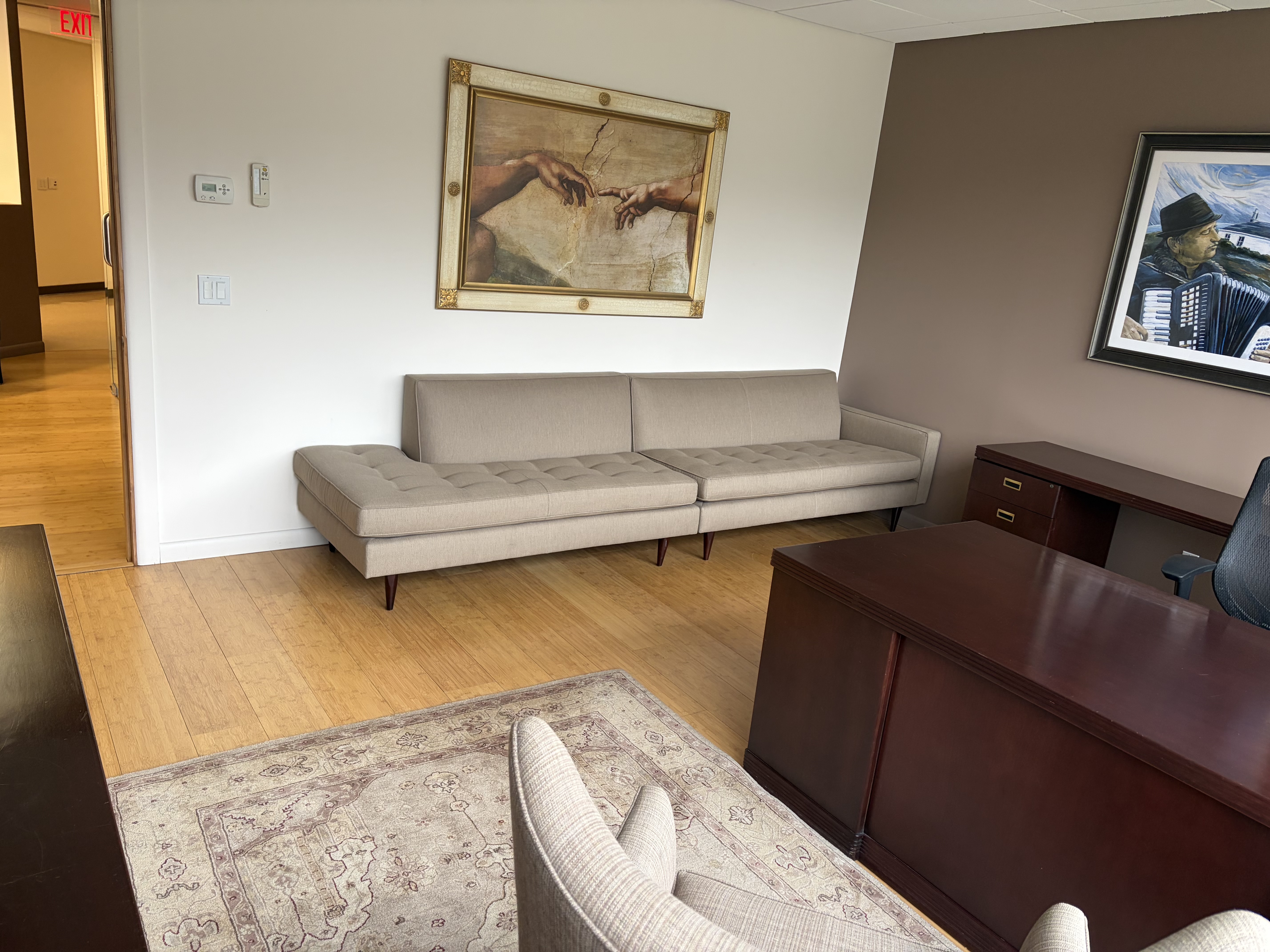 Private office with sofa seating